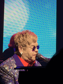 Elton belting them out: at the Oscars viewing party